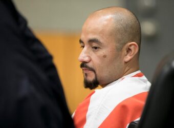 Areli Escobar listens during a hearing about his capital murder conviction at the Blackwell-Thurman Criminal Justice Center in 2018.